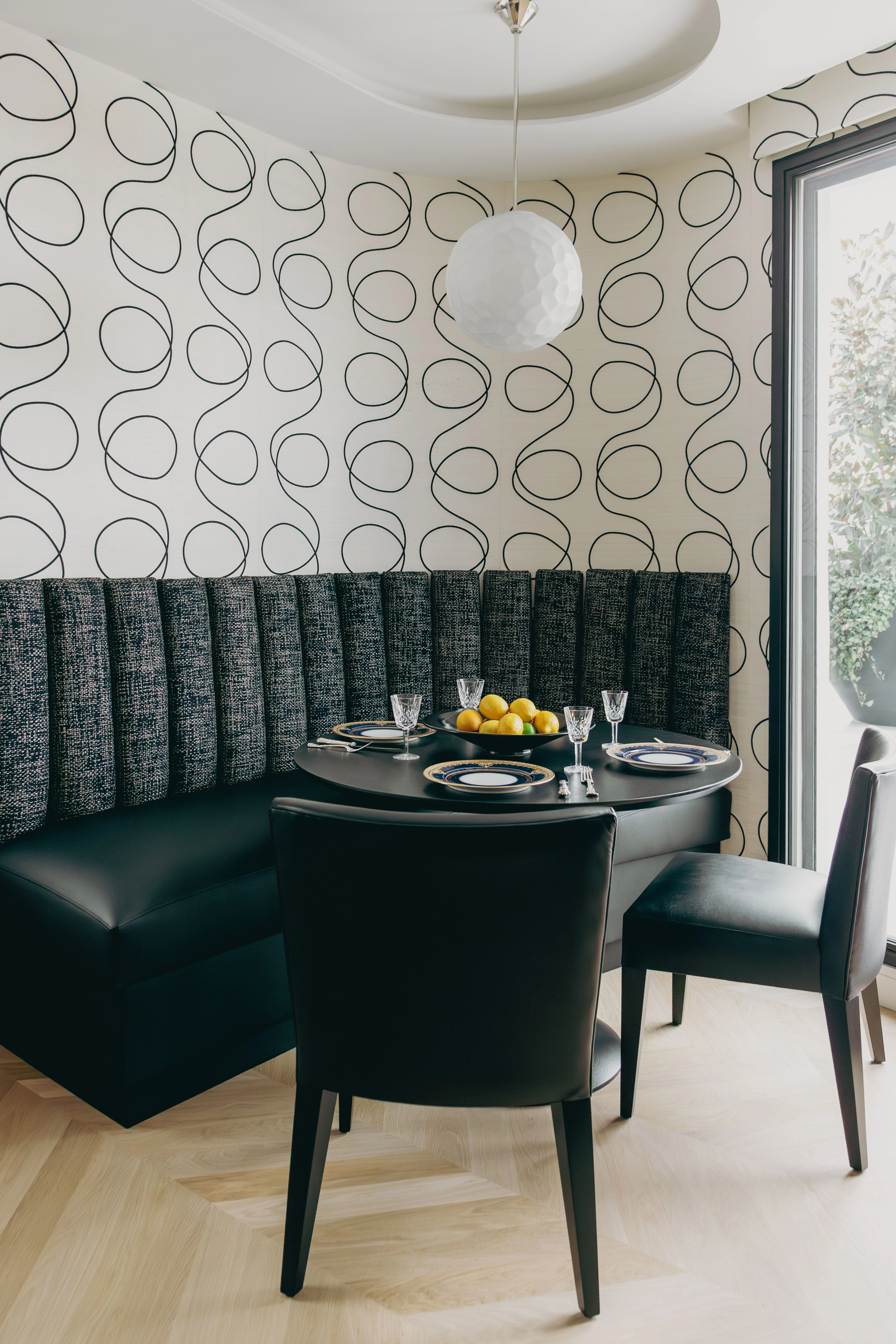 Breakfast nook with pattern wallpaper